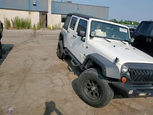 2009 Jeep Wrangler Unlimited X VIN: 1J4GA39139L786861 Lot: 64323934