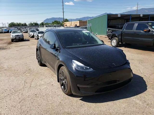 2023 Tesla Model Y VIN: 7SAYGDEE9PF699184 Lot: 63128004