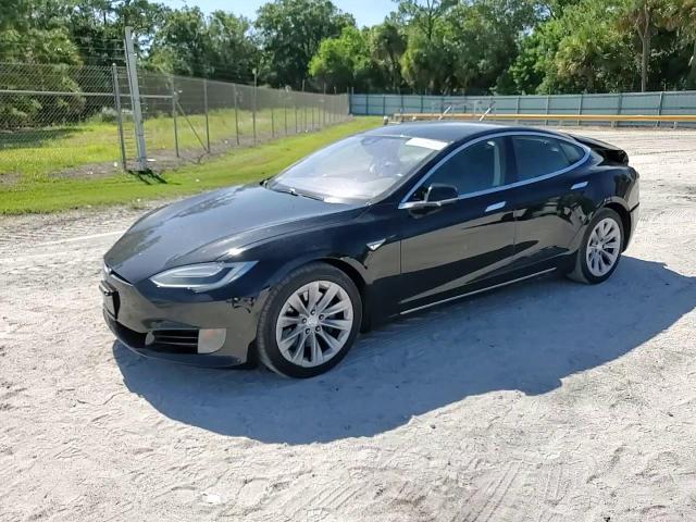 2016 Tesla Model S VIN: 5YJSA1E17GF144296 Lot: 63448924