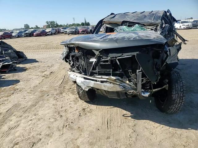 2000 Chevrolet Tahoe K1500 VIN: 1GNEK13T5YJ208593 Lot: 64158575