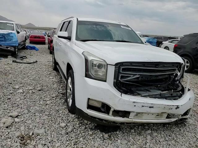2015 GMC Yukon Xl K1500 Slt VIN: 1GKS2HKC7FR552807 Lot: 64650465