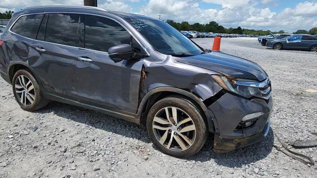 2018 Honda Pilot Touring VIN: 5FNYF5H99JB012779 Lot: 64201545