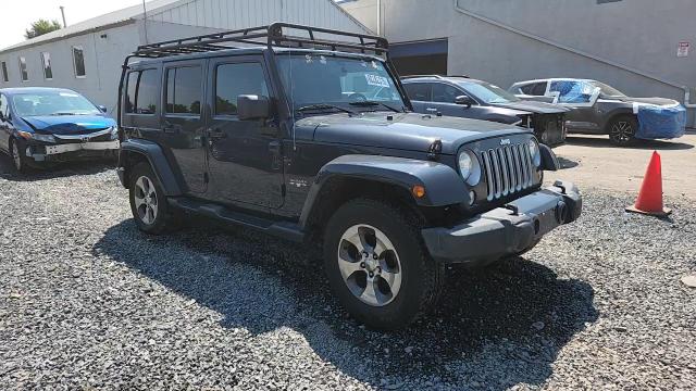 2016 Jeep Wrangler Unlimited Sahara VIN: 1C4BJWEG2GL288756 Lot: 62282015