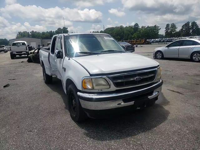 1998 Ford F150 VIN: 1FTZX17W3WNC13958 Lot: 63254575