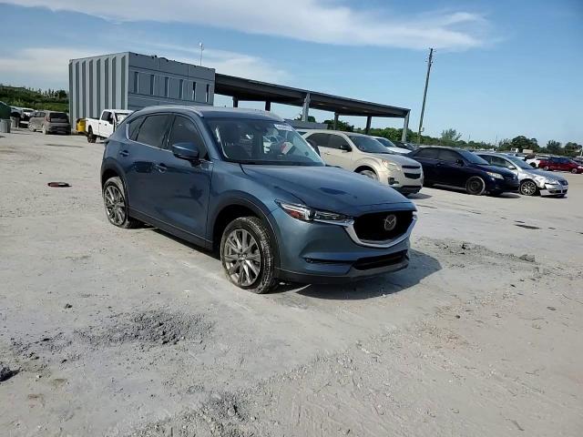 2021 Mazda Cx-5 Grand Touring VIN: JM3KFADM9M0387512 Lot: 64304015