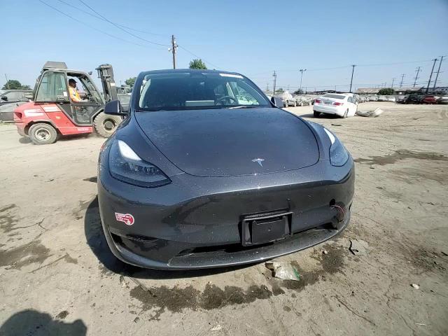 2023 Tesla Model Y VIN: 7SAYGDEE8PF903067 Lot: 66915945