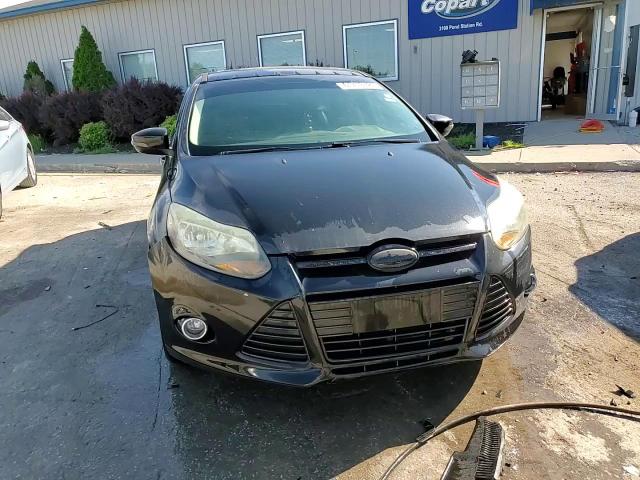 2014 Ford Focus Titanium VIN: 1FADP3N29EL411384 Lot: 61713725