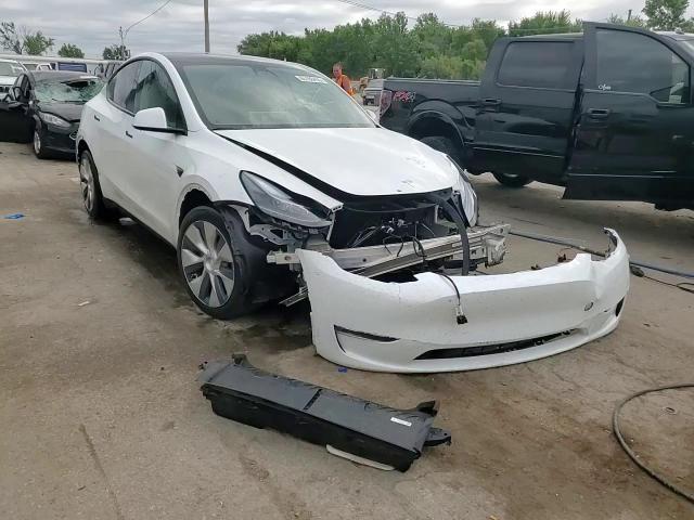 2023 Tesla Model Y VIN: 7SAYGDEEXPF613445 Lot: 65186455