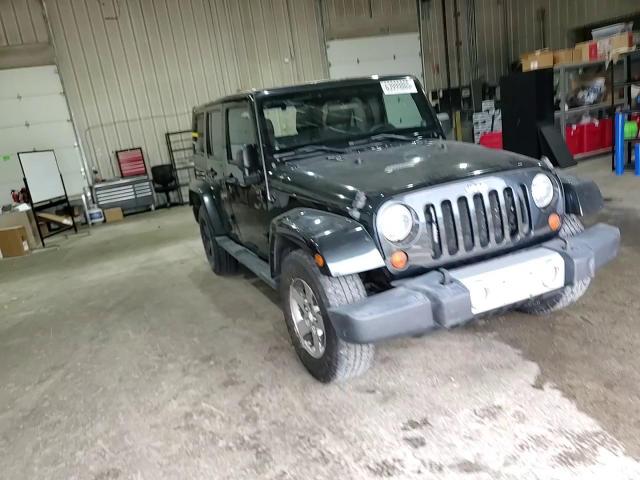 2012 Jeep Wrangler Unlimited Sahara VIN: 1C4BJWEG1CL219485 Lot: 63999865