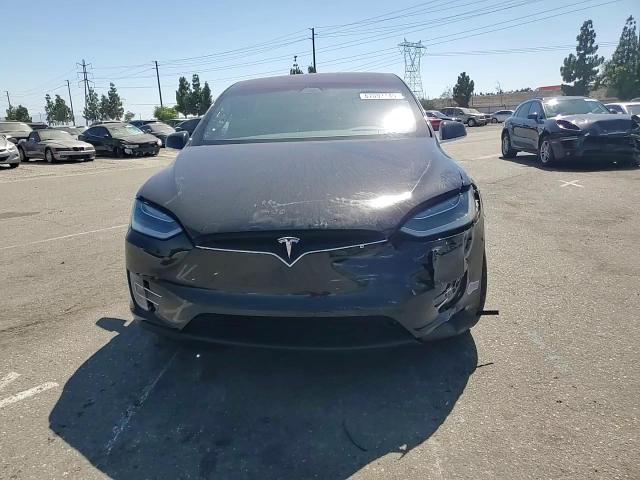 2018 Tesla Model X VIN: 5YJXCDE28JF140212 Lot: 67001145