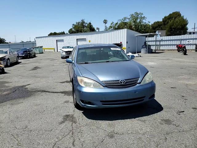 2003 Toyota Camry Le VIN: JTDBE32K930175703 Lot: 64996775
