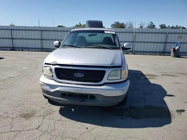 2002 Ford F150 VIN: 1FTRF17262NA75519 Lot: 64117805