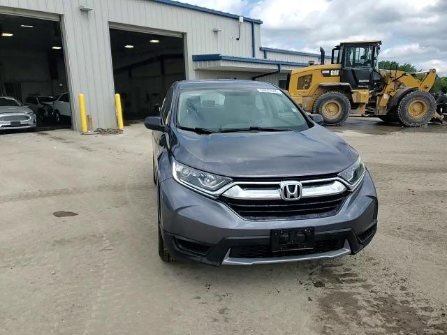 2018 Honda Cr-V Lx VIN: 5J6RW6H38JL003455 Lot: 64842085