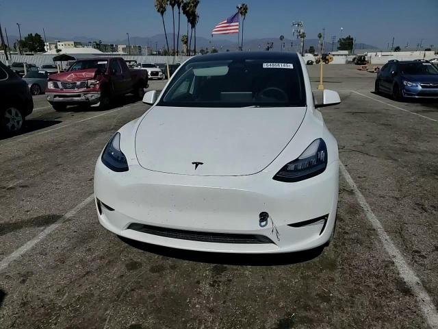 2023 Tesla Model Y VIN: 7SAYGDEE4PA063382 Lot: 64868145