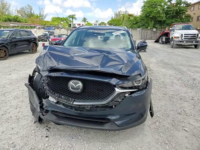 2021 Mazda Cx-5 Touring VIN: JM3KFACM7M0303172 Lot: 64425965