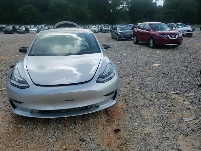 2018 Tesla Model 3 VIN: 5YJ3E1EB6JF096198 Lot: 64338595