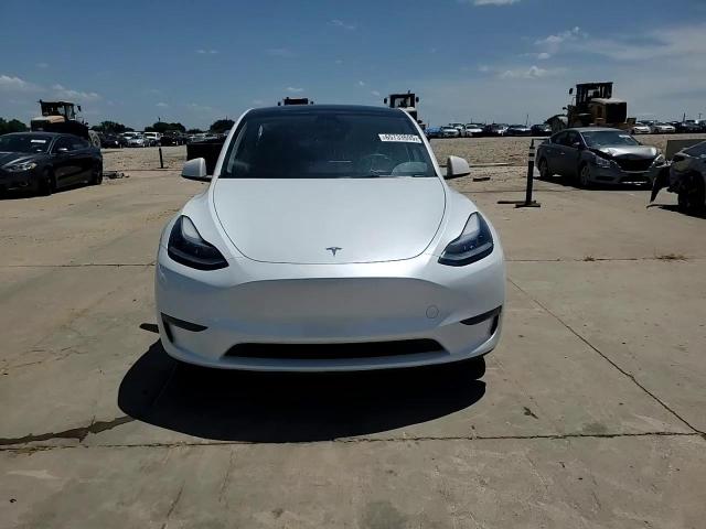2023 Tesla Model Y VIN: 7SAYGDEE6PA130256 Lot: 65733695