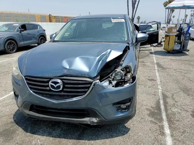 2016 Mazda Cx-5 Touring VIN: JM3KE2CY4G0674855 Lot: 64539285