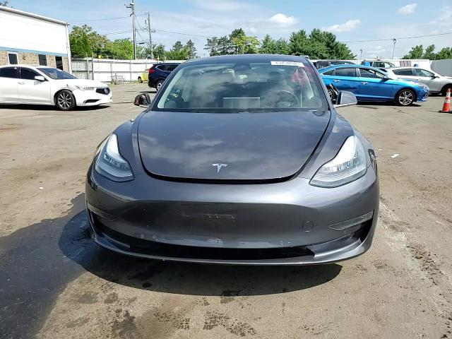 2018 Tesla Model 3 VIN: 5YJ3E1EA3JF163041 Lot: 63430585