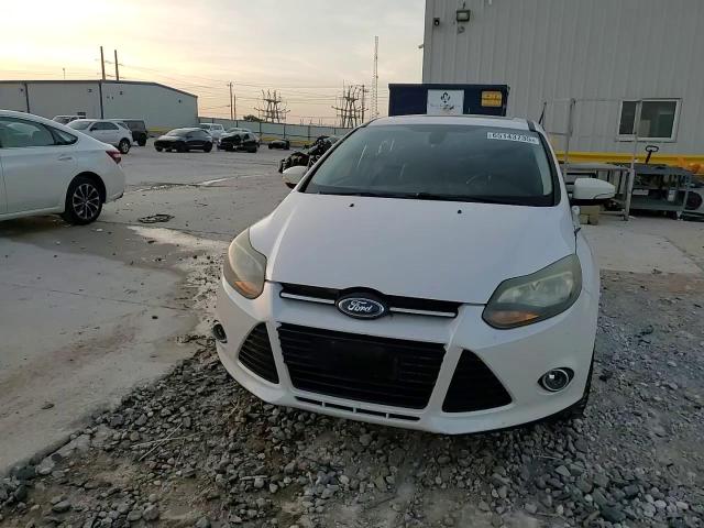 2012 Ford Focus Titanium VIN: 1FAHP3J21CL330464 Lot: 65143735