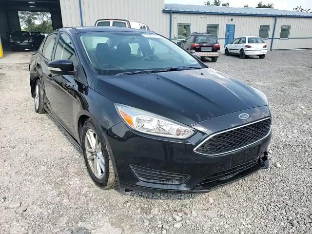 2015 Ford Focus Se VIN: 1FADP3F26FL229318 Lot: 66919475