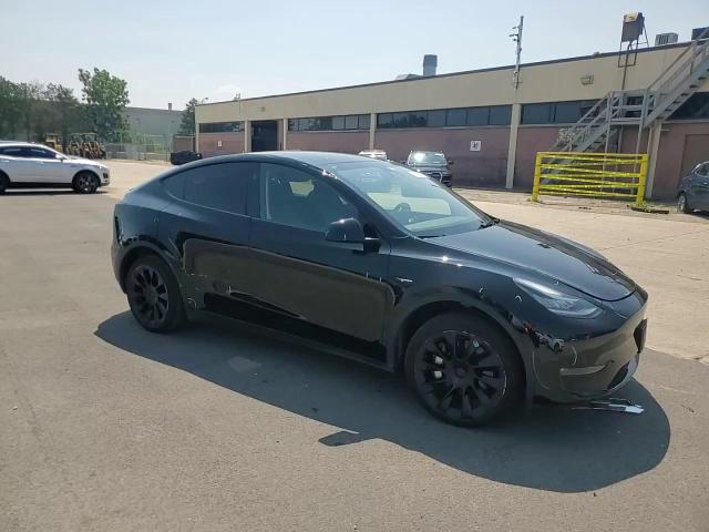 2023 Tesla Model Y VIN: 7SAYGDEE7PA156042 Lot: 63875415