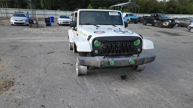 2015 Jeep Wrangler Unlimited Sport VIN: 1C4BJWDG9FL568528 Lot: 62864405