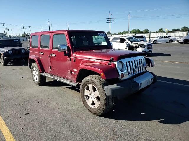 2011 Jeep Wrangler Unlimited Sahara VIN: 1J4HA5H10BL543080 Lot: 63823935