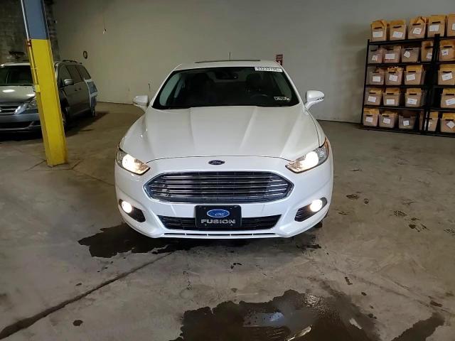 2016 Ford Fusion Titanium VIN: 3FA6P0D92GR242531 Lot: 63233135