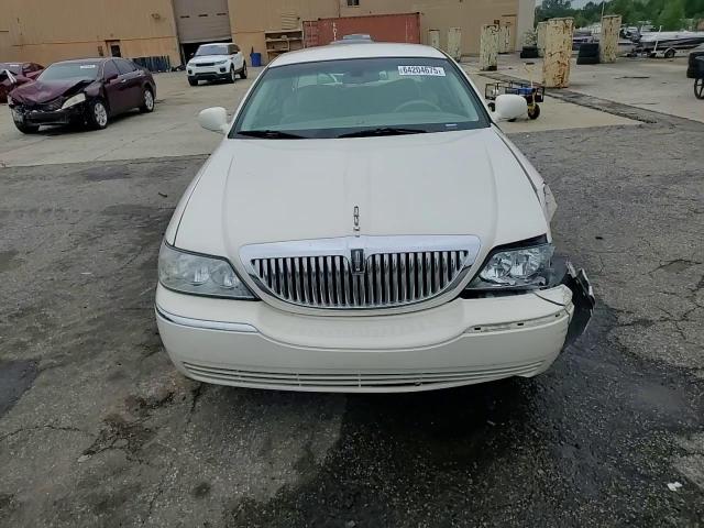 2007 Lincoln Town Car Signature VIN: 1LNHM81W97Y600466 Lot: 64204675