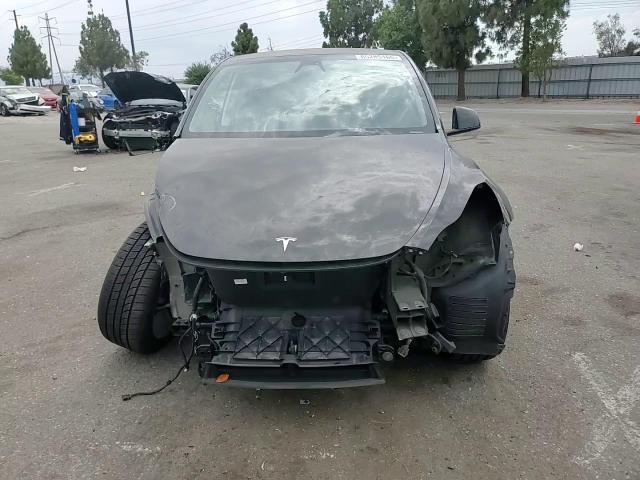 2023 Tesla Model Y VIN: 7SAYGDEE3PA110126 Lot: 65285165