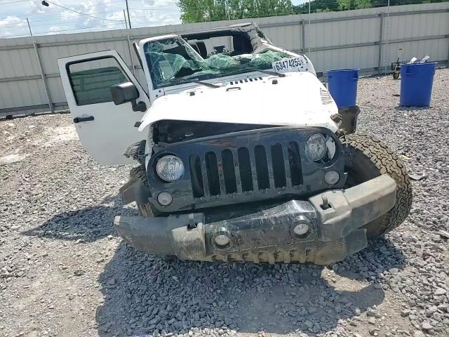 2015 Jeep Wrangler Sport VIN: 1C4AJWAG7FL704493 Lot: 63474255