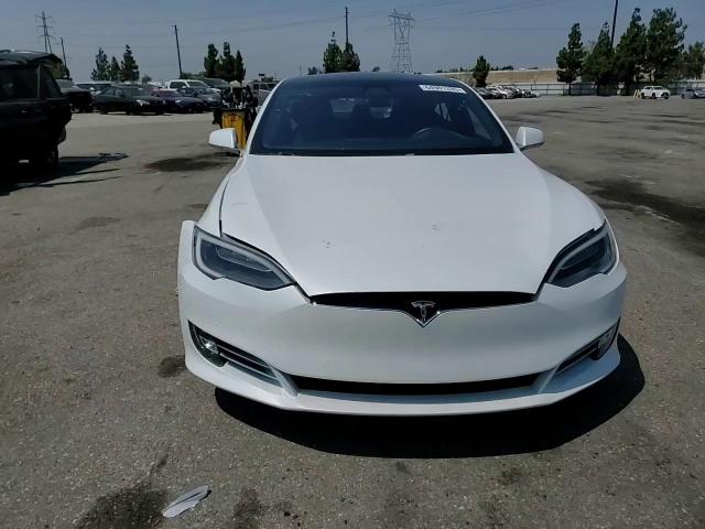 2017 Tesla Model S VIN: 5YJSA1E17HF186954 Lot: 64981335