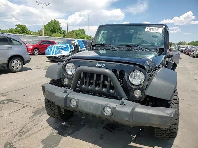 2014 Jeep Wrangler Unlimited Sport VIN: 1C4BJWDG5EL156329 Lot: 63916205