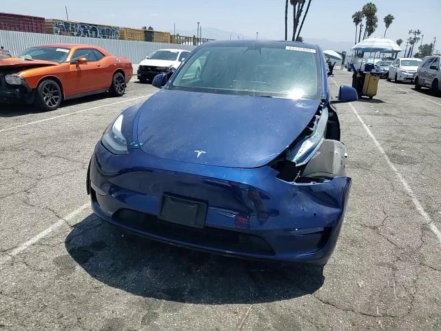 2021 Tesla Model Y VIN: 5YJYGAEE8MF305133 Lot: 63115005