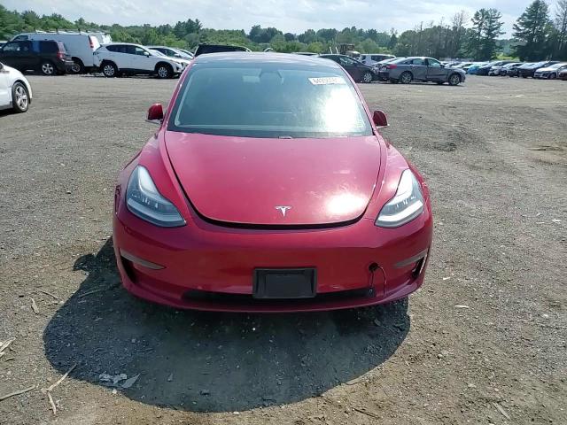 2018 Tesla Model 3 VIN: 5YJ3E1EA9JF053305 Lot: 64936685