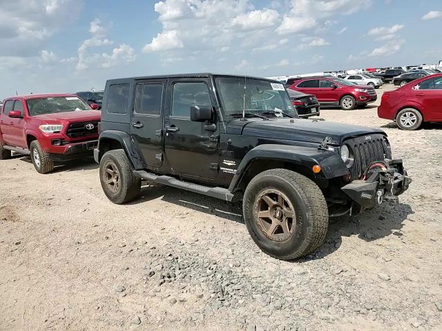 2009 Jeep Wrangler Unlimited Sahara VIN: 1J4GA59119L787129 Lot: 64884105