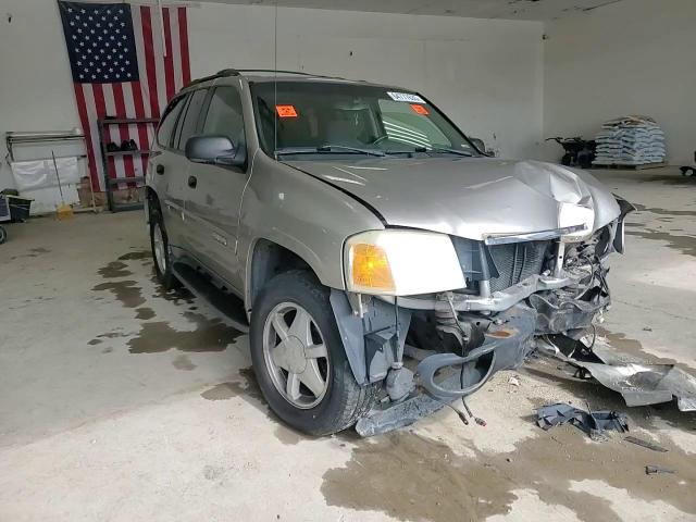 2003 GMC Envoy VIN: 1GKDT13S432309737 Lot: 64777635