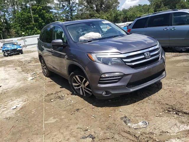 2018 Honda Pilot Touring VIN: 5FNYF6H99JB069585 Lot: 64240475