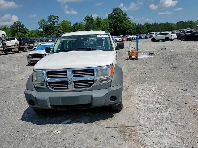 2007 Dodge Nitro Sxt VIN: 1D8GT28K47W592387 Lot: 63061435