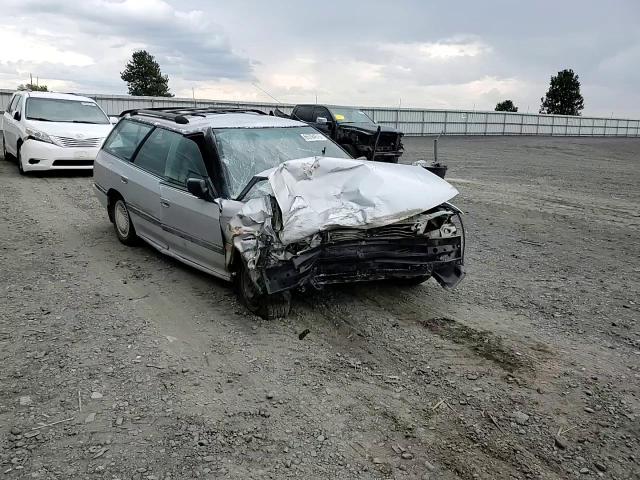1993 Subaru Legacy L VIN: 4S3BJ6334P7945615 Lot: 65794615