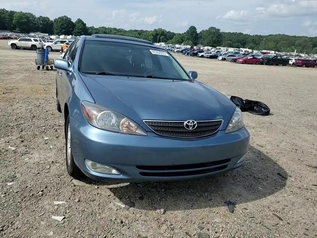 2003 Toyota Camry Le VIN: 4T1BF32K03U560942 Lot: 65364095