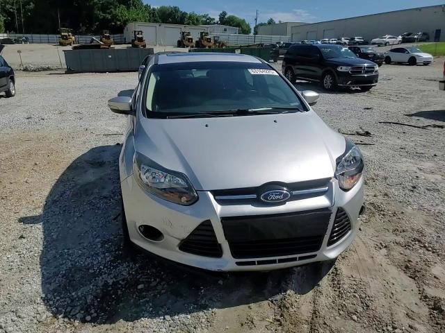 2014 Ford Focus Titanium VIN: 1FADP3N27EL409889 Lot: 63164225