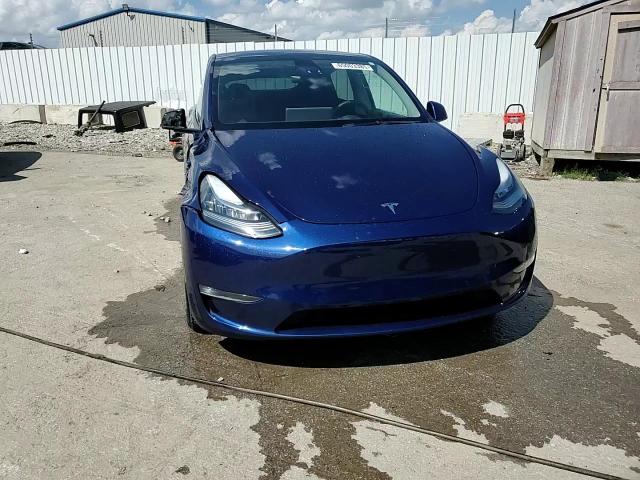 2023 Tesla Model Y VIN: 7SAYGDEE3PA029417 Lot: 65003385