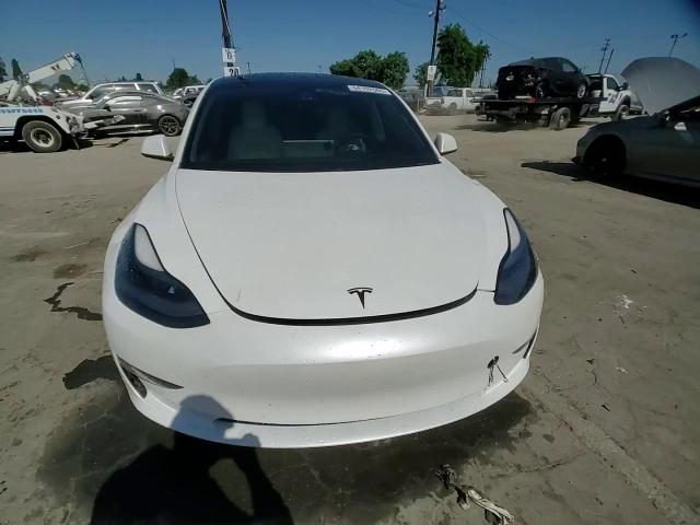 2021 Tesla Model 3 VIN: 5YJ3E1EB2MF053997 Lot: 69117805