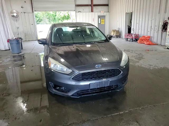 2015 Ford Focus Se VIN: 1FADP3F29FL310622 Lot: 63591065