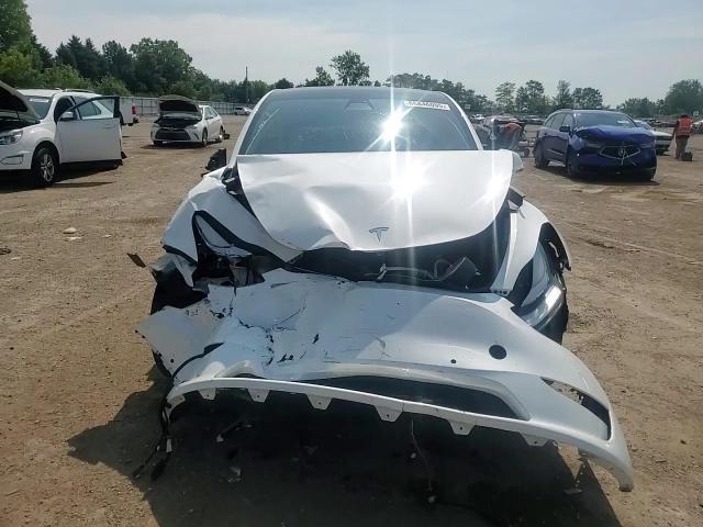 2021 Tesla Model Y VIN: 5YJYGDEE9MF265209 Lot: 66846095