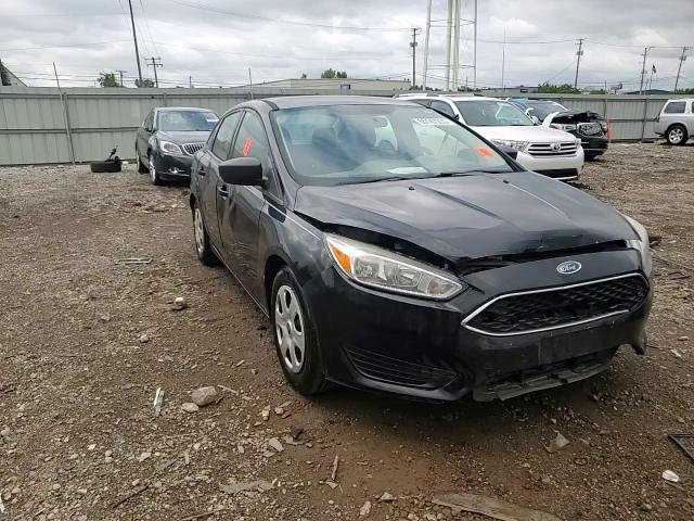 2015 Ford Focus S VIN: 1FADP3E24FL268135 Lot: 65147035