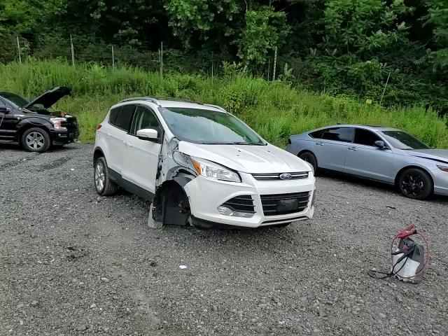 2016 Ford Escape Titanium VIN: 1FMCU9J92GUA58483 Lot: 65204605