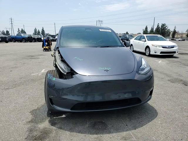 2023 Tesla Model Y VIN: 7SAYGDEEXPA065394 Lot: 65344255
